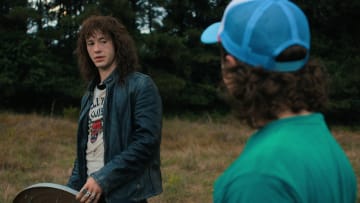 STRANGER THINGS. (L to R) Joseph Quinn as Eddie Munson and Gaten Matarazzo as Dustin Henderson in STRANGER THINGS. Cr. Courtesy of Netflix © 2022