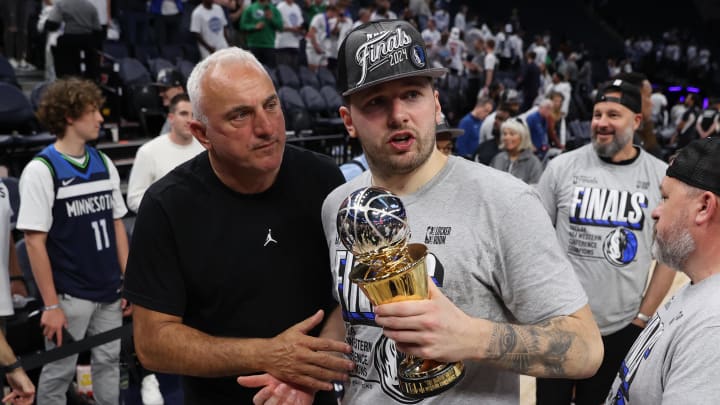 May 30, 2024; Minneapolis, Minnesota, USA; Dallas Mavericks guard Luka Doncic (77) celebrates after winning the Western Confrerence Championship against the Minnesota Timberwolves in game five of the western conference finals for the 2024 NBA playoffs at Target Center. Mandatory Credit: Jesse Johnson-USA TODAY Sports