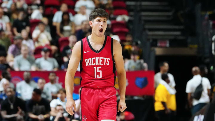 Jul 14, 2024; Las Vegas, NV, USA; Houston Rockets guard Reed Sheppard (15) reacts after scoring against the Washington Wizards during the third quarter at Thomas & Mack Center. Mandatory Credit: Stephen R. Sylvanie-USA TODAY Sports