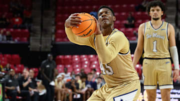 Nov 8, 2024; College Park, Maryland, USA; Mount St. Mary's Mountaineers guard Xavier Lipscomb (45) takes a free throw during the first half against the Maryland Terrapins at Xfinity Center. Mandatory Credit: Reggie Hildred-Imagn Images