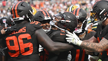 Sep 21, 2025; Cleveland, Ohio, USA; Cleveland Browns safety Grant Delpit (9) celebrates with the Browns defense after an interception against the Green Bay Packers during the fourth quarter at Huntington Bank Field. Mandatory Credit: Ken Blaze-Imagn Images