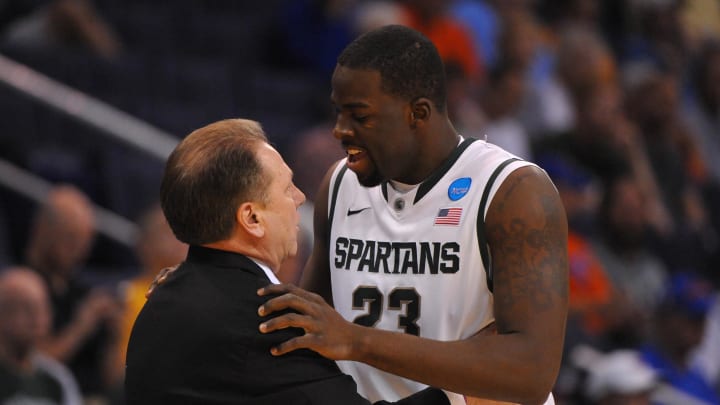 March 22, 2012; Phoenix, AZ, USA; Michigan State Spartans forward Draymond Green (23) talks to head coach Tom Izzo (left) during the first half in the semifinals of the west region of the 2012 NCAA men's basketball tournament against the Louisville Cardinals at US Airways Center.  Mandatory Credit: Christopher Hanewickel-USA TODAY Sports