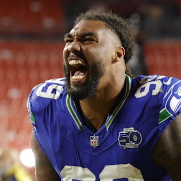 Nov 2, 2025; Landover, Maryland, USA;  Seattle Seahawks defensive end Leonard Williams (99) reacts to the win against the Washington Commanders at Northwest Stadium. Mandatory Credit: Geoff Burke-Imagn Images