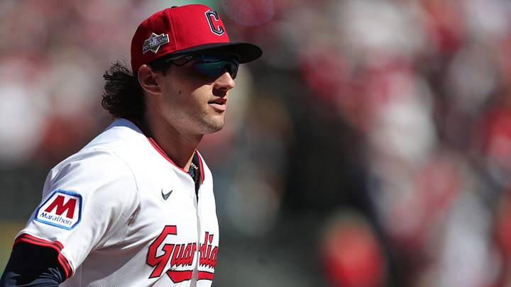 Cleveland Guardians center fielder Chase DeLauter (34) jogs back to the dugout during the first inning of Game 2 of the American League wild card series at Progressive Field, Oct. 1, 2025, in Cleveland, Ohio.