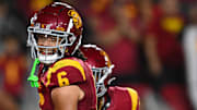Sep 7, 2024; Los Angeles, California, USA; USC Trojans wide receiver Makai Lemon (6) celebrates after scoring a touchdown against the Utah State Aggies during the second quarter at United Airlines Field at Los Angeles Memorial Coliseum. Mandatory Credit: Jonathan Hui-Imagn Images