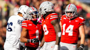 Ohio State Buckeyes cornerback Davison Igbinosun (1) and linebacker Arvell Reese (8) celebrate after Reese sacked the quarterback in the second half of the college football game at Ohio Stadium on Saturday, Nov. 1, 2025 in Columbus, Ohio.