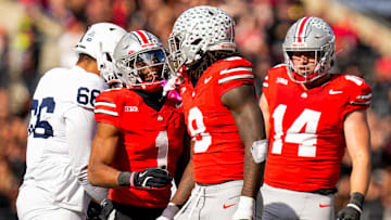 Ohio State Buckeyes cornerback Davison Igbinosun (1) and linebacker Arvell Reese (8) celebrate after Reese sacked the quarterback in the second half of the college football game at Ohio Stadium on Saturday, Nov. 1, 2025 in Columbus, Ohio.