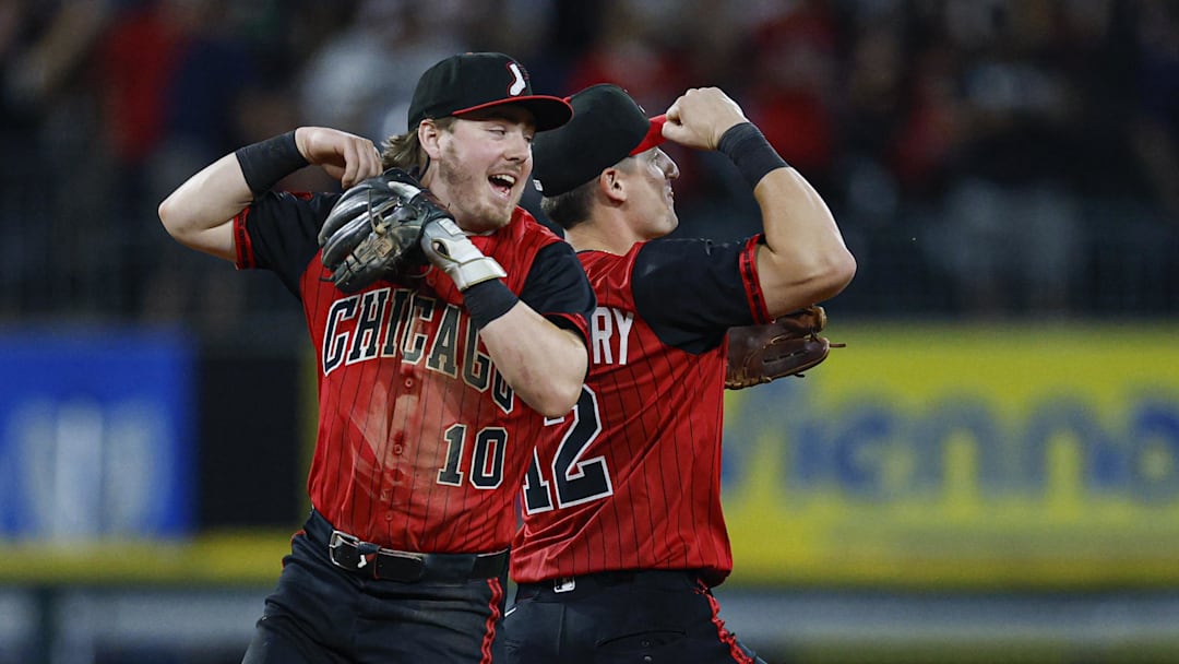 Sep 19, 2025; Chicago, Illinois, USA; Chicago White Sox second baseman Chase Meidroth (10) and shortstop Colson Montgomery (12) celebrate team's win against the San Diego Padres at Rate Field. Mandatory Credit: Kamil Krzaczynski-Imagn Images