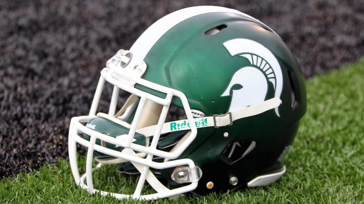 Sep 4, 2015; Kalamazoo, MI, USA; General view of Michigan State Spartans helmet on field prior to a game against Western Michigan at Waldo Stadium. Mandatory Credit: Mike Carter-USA TODAY Sports