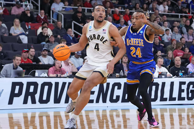 Purdue forward Trey Kaufman-Renn drives against McNeese State Cowboys forward Christian Shumate.
