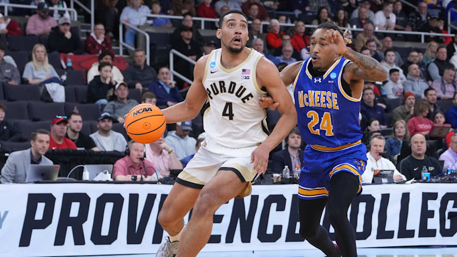 Purdue forward Trey Kaufman-Renn drives against McNeese State Cowboys forward Christian Shumate.