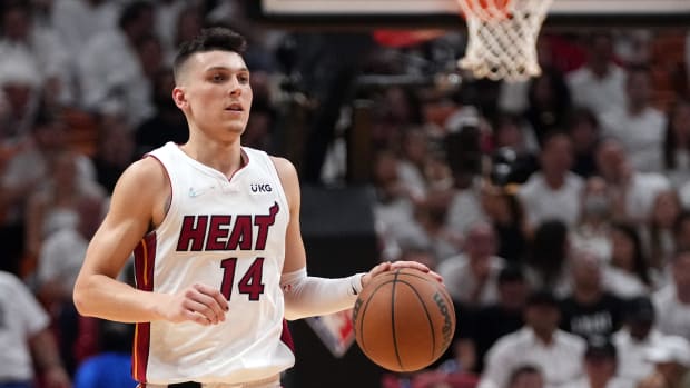 May 17, 2022; Miami, Florida, USA; Miami Heat guard Tyler Herro (14) brings the ball up the court against the Boston Celtics during the second half of game one of the 2022 eastern conference finals at FTX Arena. Mandatory Credit: Jasen Vinlove-USA TODAY Sports