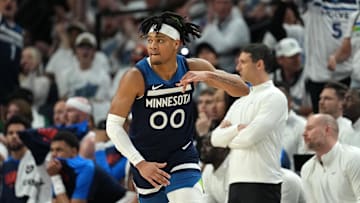 May 26, 2025; Minneapolis, Minnesota, USA; Minnesota Timberwolves guard Terrence Shannon Jr. (00) reacts against the Oklahoma City Thunder in the first half during game four of the western conference finals for the 2025 NBA Playoffs at Target Center. Mandatory Credit: Jesse Johnson-Imagn Images