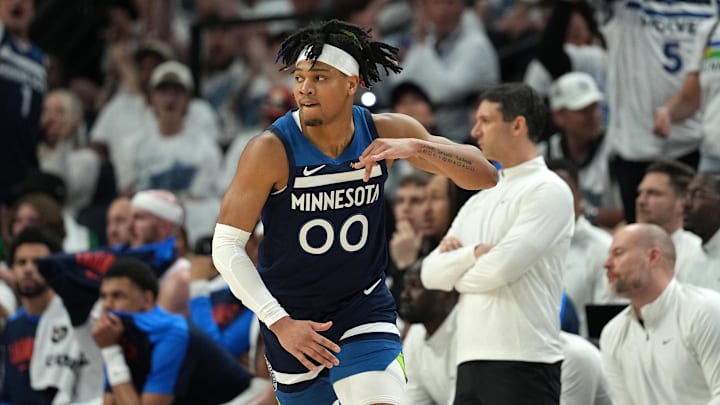 May 26, 2025; Minneapolis, Minnesota, USA; Minnesota Timberwolves guard Terrence Shannon Jr. (00) reacts against the Oklahoma City Thunder in the first half during game four of the western conference finals for the 2025 NBA Playoffs at Target Center. Mandatory Credit: Jesse Johnson-Imagn Images