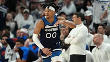 May 26, 2025; Minneapolis, Minnesota, USA; Minnesota Timberwolves guard Terrence Shannon Jr. (00) reacts against the Oklahoma City Thunder in the first half during game four of the western conference finals for the 2025 NBA Playoffs at Target Center. Mandatory Credit: Jesse Johnson-Imagn Images