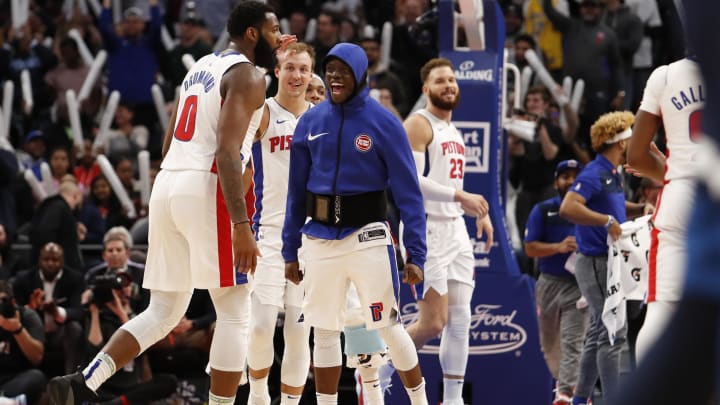 Mar 6, 2019; Detroit, MI, USA; Detroit Pistons guard Reggie Jackson (1) celebrates with center Andre Drummond (0) during the fourth quarter against the Minnesota Timberwolves at Little Caesars Arena. Mandatory Credit: Raj Mehta-USA TODAY Sports