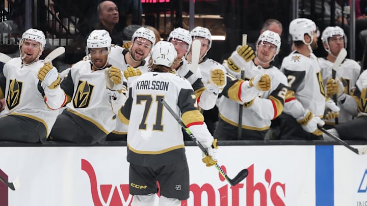 Nov 15, 2024; Salt Lake City, Utah, USA; Vegas Golden Knights center William Karlsson (71) reacts with the bench after scoring a goal against the Utah Hockey Club during the third period at Delta Center. Mandatory Credit: Rob Gray-Imagn Images