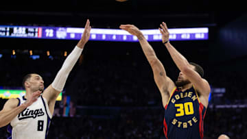 Golden State Warriors guard Stephen Curry shoots over Sacramento Kings guard Zach LaVine during the third quarter at Chase Center. 