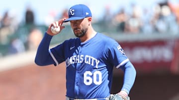 May 21, 2025; San Francisco, California, USA; Kansas City Royals relief pitcher Lucas Erceg (60) adjusts his hat during the ninth inning against the San Francisco Giants at Oracle Park. Mandatory Credit: Kelley L Cox-Imagn Images