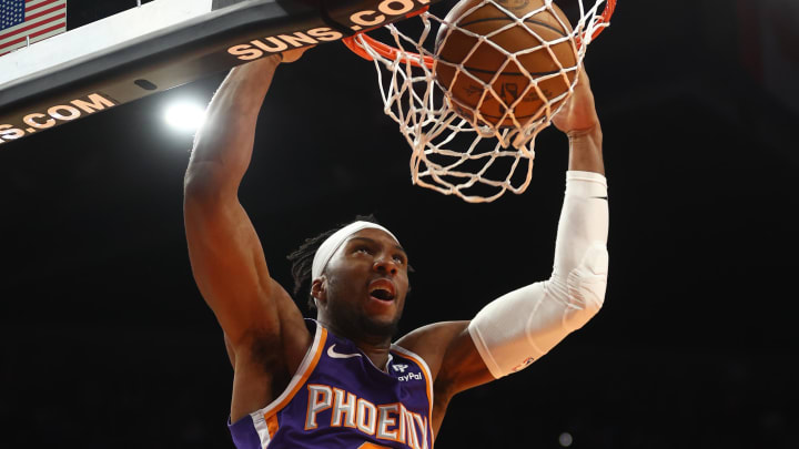 Phoenix Suns forward Josh Okogie (2) dunks the ball. Phoenix Suns forward Josh Okogie (2) dunks the ball.
