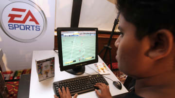 An Indian boy plays a '2006 FIFA World C