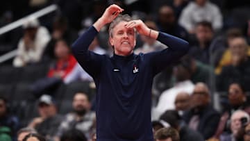 Nov 25, 2025; Washington, District of Columbia, USA; Washington Wizards head coach Brian Keefe gestures from the bench against the Atlanta Hawks in the first half at Capital One Arena. Mandatory Credit: Geoff Burke-Imagn Images
