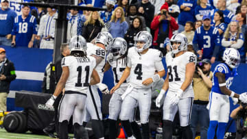 Dec 31, 2023; Indianapolis, Indiana, USA; Las Vegas Raiders wide receiver Davante Adams (17) celebrates his touchdown with teammates in the second half against the Indianapolis Colts at Lucas Oil Stadium. Mandatory Credit: Trevor Ruszkowski-USA TODAY Sports