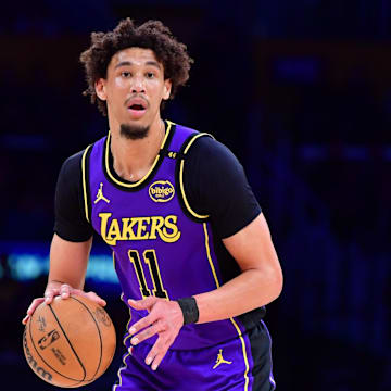 Feb 6, 2025; Los Angeles, California, USA;  Los Angeles Lakers center Jaxson Hayes (11) controls the ball against the against the Golden State Warriors during the first half at Crypto.com Arena. Mandatory Credit: Gary A. Vasquez-Imagn Images