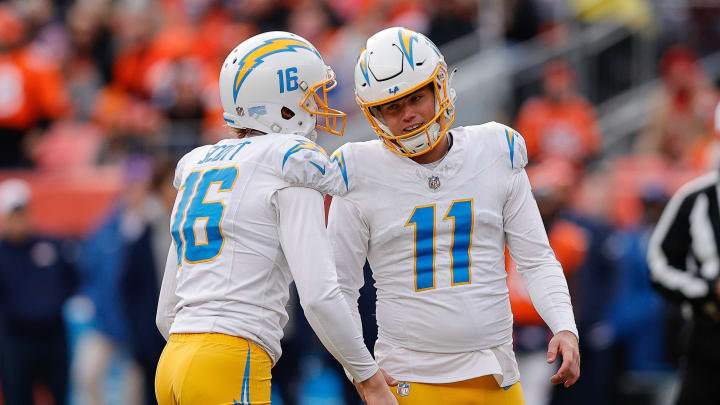 Dec 31, 2023; Denver, Colorado, USA; Los Angeles Chargers place kicker Cameron Dicker (11) reacts after kicking a field goal with punter JK Scott (16) in the second quarter against the Denver Broncos at Empower Field at Mile High. Mandatory Credit: Isaiah J. Downing-USA TODAY Sports