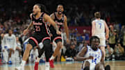 Apr 5, 2025; San Antonio, TX, USA; Houston Cougars guard Emanuel Sharp (21) and Houston Cougars forward J'Wan Roberts (13) celebrate defeating the Duke Blue Devils in the semifinals of the men's Final Four of the 2025 NCAA Tournament at the Alamodome. Mandatory Credit: Robert Deutsch-Imagn Images