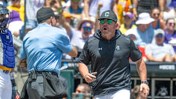 Jun 22, 2025; Omaha, Neb, USA;  Coastal Carolina Chanticleers head coach Kevin Schnall (9) gets thrown out of the game arguing with the umpires during the game against the LSU Tigers during the first inning at Charles Schwab Field. Mandatory Credit: Steven Branscombe-Imagn Images