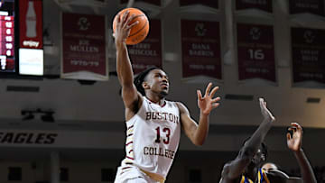 Mar 2, 2024; Chestnut Hill, Massachusetts, USA; Boston College Eagles guard Donald Hand Jr. (13) shoots a lay up against the Pittsburgh Panthers during the second half at Conte Forum. Mandatory Credit: Eric Canha-Imagn Images