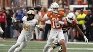 Nov 1, 2025; Austin, Texas, USA; Texas Longhorns quarterback Arch Manning (16) passes ahead of Vanderbilt Commodores defensive back Thomas Jones (9) during the second half at Darrell K Royal-Texas Memorial Stadium. Mandatory Credit: Scott Wachter-Imagn Images