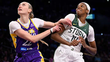 Aug 10, 2025; Los Angeles, California, USA; Los Angeles Sparks forward Cameron Brink (22) and Seattle Storm center Dominique Malonga (14) jockey for rebounding position during a WNBA game at Crypto.com Arena. Mandatory Credit: Robert Hanashiro-Imagn Images