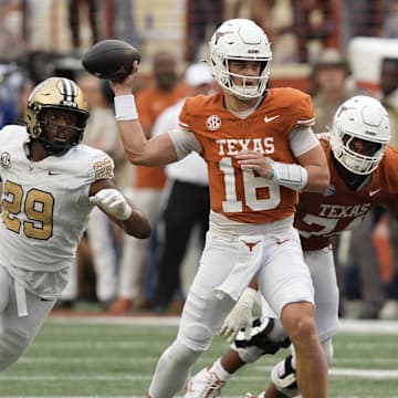 Nov 1, 2025; Austin, Texas, USA; Texas Longhorns quarterback Arch Manning (16) passes ahead of Vanderbilt Commodores defensive back Thomas Jones (9) during the second half at Darrell K Royal-Texas Memorial Stadium. Mandatory Credit: Scott Wachter-Imagn Images