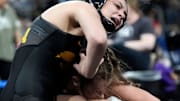 Iowa’s Emily Frost wrestles Team Nazar Training Center’s Madilyn Peach in a 131-pound match during the Soldier Salute wrestling tournament on Sunday, Dec. 29, 2024, at Xtream Arena in Coralville, Iowa.