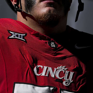 Oct 11, 2025; Cincinnati, Ohio, USA; The Cincinnati logo is seen on a player’s jersey before the game between the UCF Knights and the Cincinnati Bearcats at Nippert Stadium. Mandatory Credit: Aaron Doster-Imagn Images