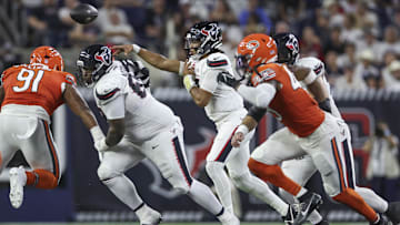 C.J. Stroud eludes the Bears pass rush during Sunday night's 19-13 Houston victory.