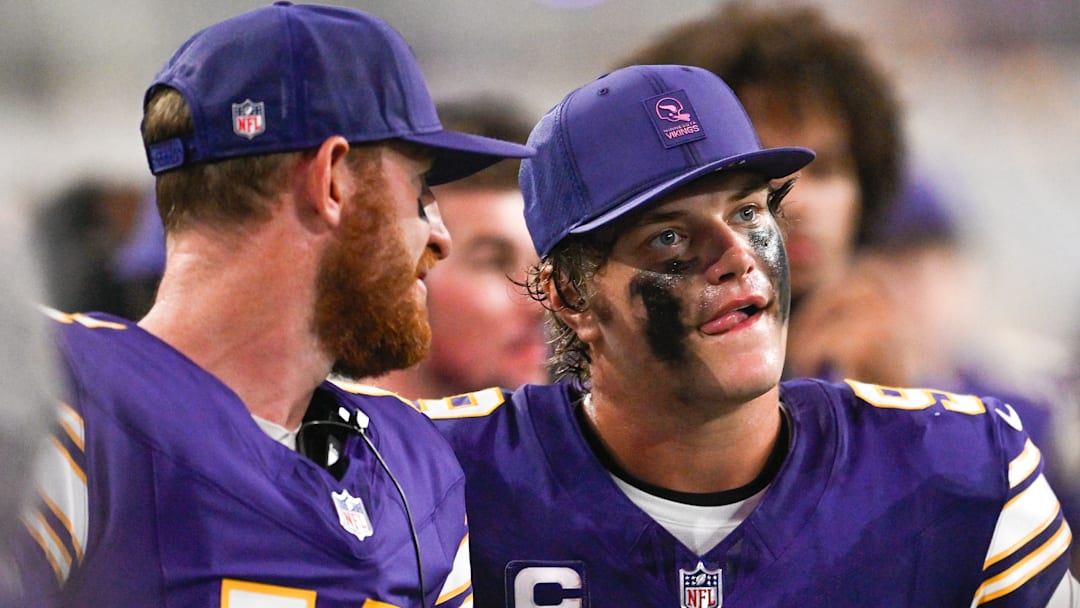 Minnesota Vikings QBs Carson Wentz (L) and J.J. McCarthy (R)