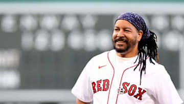 Manny Ramirez threw a ceremonial first pitch as part of the Red Sox Hall of Fame induction before a game against the Detroit Tigers at Fenway Park on June 20, 2022.