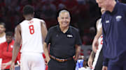 Dec 13, 2025; Houston, Texas, USA; Houston Cougars head coach Kelvin Sampson smiles during the first half against the New Orleans Privateers at Fertitta Center. Mandatory Credit: Troy Taormina-Imagn Images