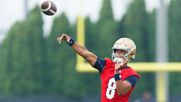 Notre Dame quarterback Kenny Minchey throws a pass during a football practice at Irish Athletic Center on Thursday, July 31, 2025, in South Bend.