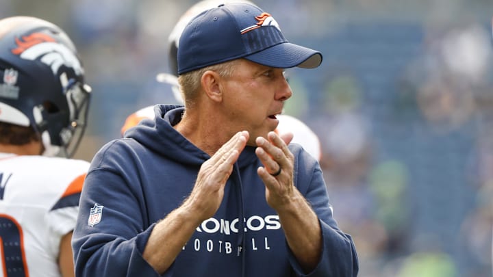 Sep 8, 2024; Seattle, Washington, USA; Denver Broncos head coach Sean Payton watches pregame warmups against the Seattle Seahawks at Lumen Field. 