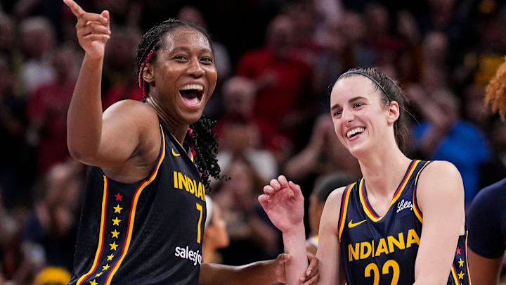 Indiana Fever forward Aliyah Boston (7) celebrates with Indiana Fever guard Caitlin Clark (22) altering recording a triple-double Wednesday, Sept. 4, 2024, during the game at Gainbridge Fieldhouse in Indianapolis. The Indiana Fever defeated the Los Angeles Sparks, 93-86. Indiana Fever forward Aliyah Boston (7) celebrates with Indiana Fever guard Caitlin Clark (22) altering recording a triple-double Wednesday, Sept. 4, 2024, during the game at Gainbridge Fieldhouse in Indianapolis. The Indiana Fever defeated the Los Angeles Sparks, 93-86.