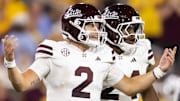 Mississippi State Bulldogs quarterback Blake Shapen (2) with running back Keyvone Lee (24) against the Arizona State Sun Devils at Mountain America Stadium.