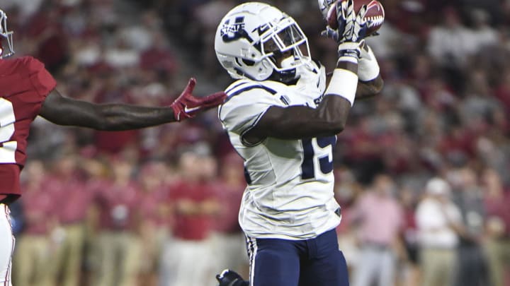 Sep 3, 2022; Tuscaloosa, A, USA;  Utah State Aggies defensive back Ike Larsen (19) intercepts a pass intended for Alabama Crimson Tide wide receiver Christian Leary (12) at Bryant-Denny Stadium. Alabama won 55-0. Mandatory Credit: Gary Cosby Jr.-USA TODAY Sports