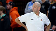 Oklahoma State head basketball coach Steve Lutz reacts during the college basketball game between the Oklahoma State University Cowboys and the Southern Illinois Salukis, Thursday, Nov. 14, 2024.