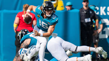Jacksonville Jaguars quarterback Trevor Lawrence (16) eludes Carolina Panthers defensive end Derrick Brown (95) during the third quarter of an NFL football game between the Carolina Panthers at Jacksonville Jaguars at EverBank Stadium Sunday September 7, 2025. Jaguars defeated the Panthers 26-10.