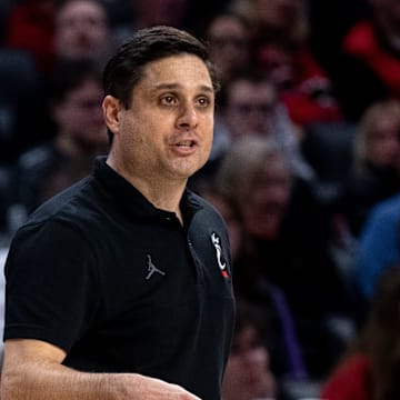 Cincinnati Bearcats head coach Wes Miller speaks to his players in the second half of the NCAA basketball game between Cincinnati Bearcats and Evansville Purple Aces at Fifth Third Arena in Cincinnati on Friday, Dec. 29, 2023.