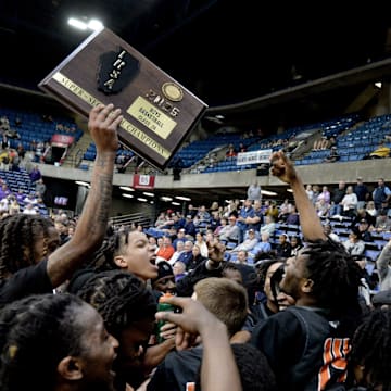 Manual players and fans celebrate their win over Williamsville during the Class 2A Springfield Supersectionals at the BOS Center Monday, March 10, 2025.